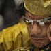 Muammar Gaddafi, Leader of the Revolution of the Great Socialist People's Libyan Arab Jamahiriya, Sits Reading in the Plenary Hall of the United Nations (UN) Building in Addis Ababa, Ethiopia, During the 12th African Union (AU) Summit