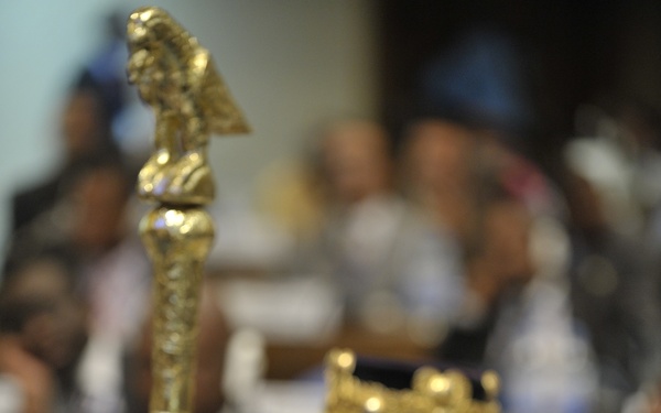 Muammar Gaddafi, leader of the Revolution of the Great Socialist People's Libyan Arab Jamahiriya, Sits Reading in the Plenary Hall of the United Nations (UN) Building in Addis Ababa, Ethiopia, During the 12th African Union (AU) Summit