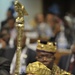 Muammar Gaddafi, leader of the Revolution of the Great Socialist People's Libyan Arab Jamahiriya, Sits Reading in the Plenary Hall of the United Nations (UN) Building in Addis Ababa, Ethiopia, During the 12th African Union (AU) Summit