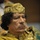 Muammar Gaddafi, leader of the Revolution of the Great Socialist People's Libyan Arab Jamahiriya, Sits Reading in the Plenary Hall of the United Nations (UN) Building in Addis Ababa, Ethiopia, During the 12th African Union (AU) Summit