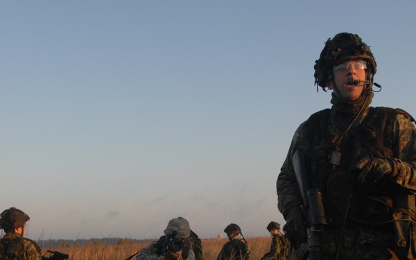 Canadian Forces Await Transport After Mission on Fort Pickett