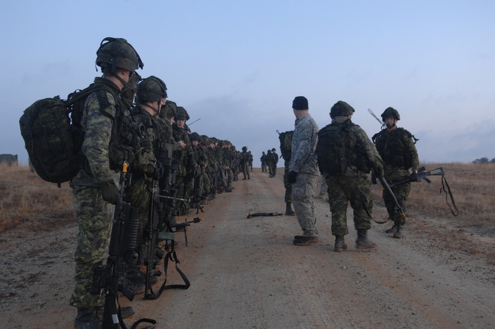 Canadian Forces Await Transport After Mission on Fort Pickett