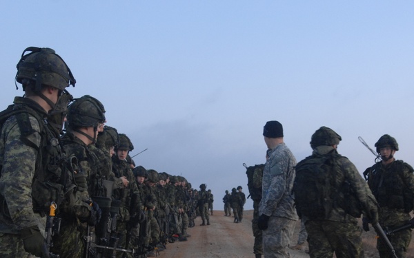 Canadian Forces Await Transport After Mission on Fort Pickett