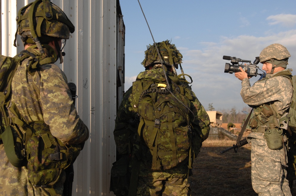 Canadian Forces Await Transport After Mission on Fort Pickett