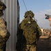 Canadian Forces Await Transport After Mission on Fort Pickett