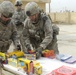 Paratroopers, Iraqi Security Force distribute new school supplies to Oubaidy schools