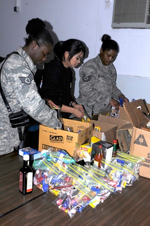 Service members volunteer to provide humanitarian assistance