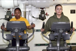 Marines and Sailors Work Out Aboard USS Bataan