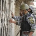 Patrol in the Zinjali neighborhood of Mosul