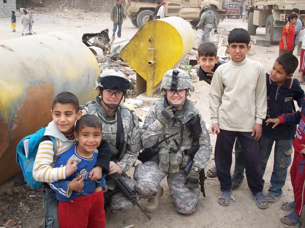 Indiana National Guard Transporters bring caring from home to school in Iraq