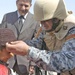 Iraqi Security Forces, Multi-National Division - Baghdad Soldiers distribute supplies to Karada schools