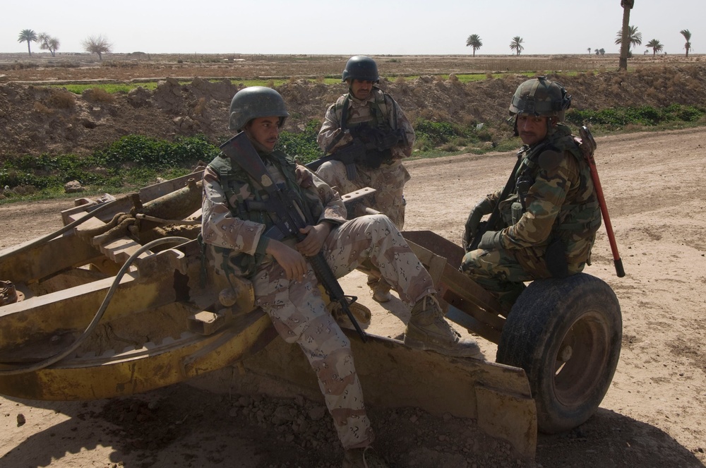 Clearing the Village of Tammuz