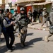 Returning a neighborhood - Joint Security Station Shulla transfer highlights security improvements