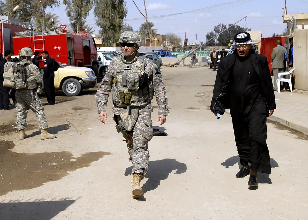 Returning a neighborhood - Joint Security Station Shulla transfer highlights security improvements
