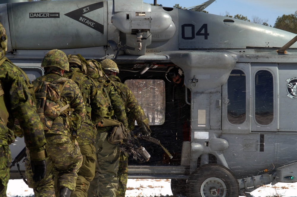 Soldiers Load Onto a MH-60 Seahawk Helicopter During Exercise Maritime Raider 09 Soldiers Load Onto a MH-60 Seahawk Helicopter During Exercise Maritime Raider 09