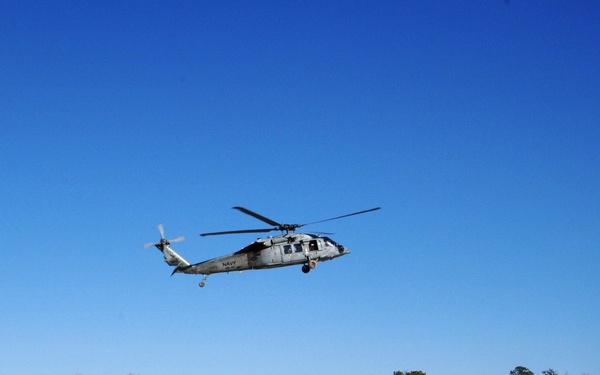 Soldiers Fly Over the Forward Operating Base During Exercise Maritime Raider 09