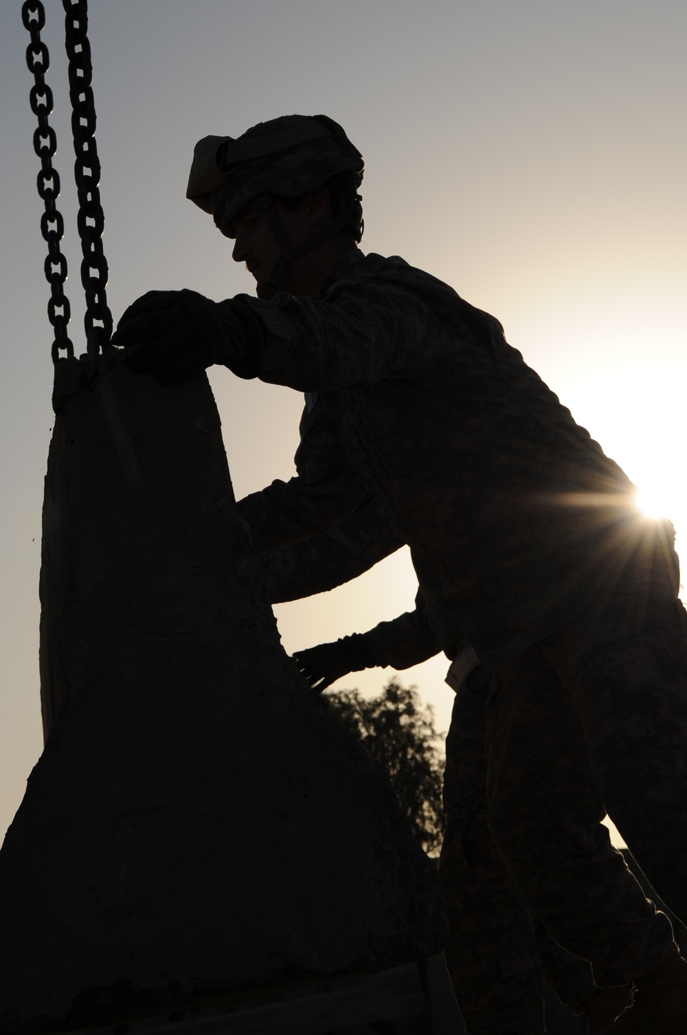 Removing barriers on Forward Operating Base Rustamiyah