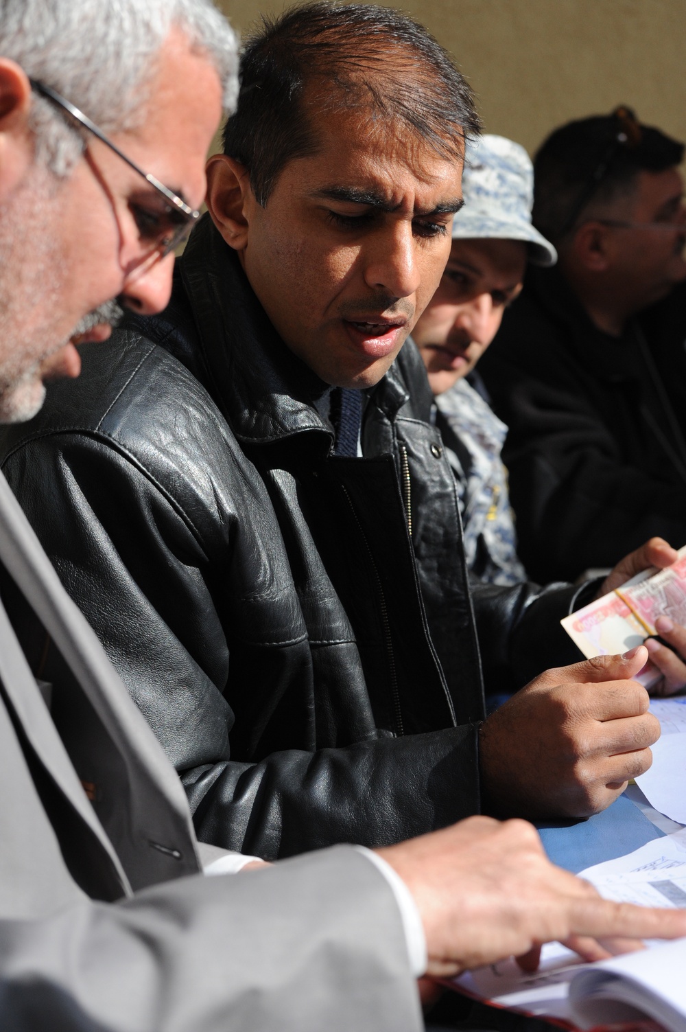 Sons of Iraq payday at Forward Operating Base Loyalty