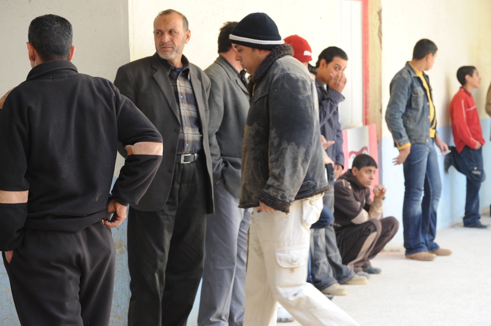 Sons of Iraq payday at Forward Operating Base Loyalty