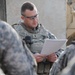 Sons of Iraq payday at Forward Operating Base Loyalty