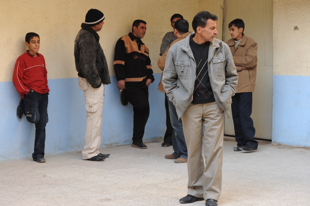 Sons of Iraq payday at Forward Operating Base Loyalty