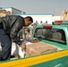 Iraqi police support local children