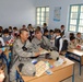 Iraqi police support local children
