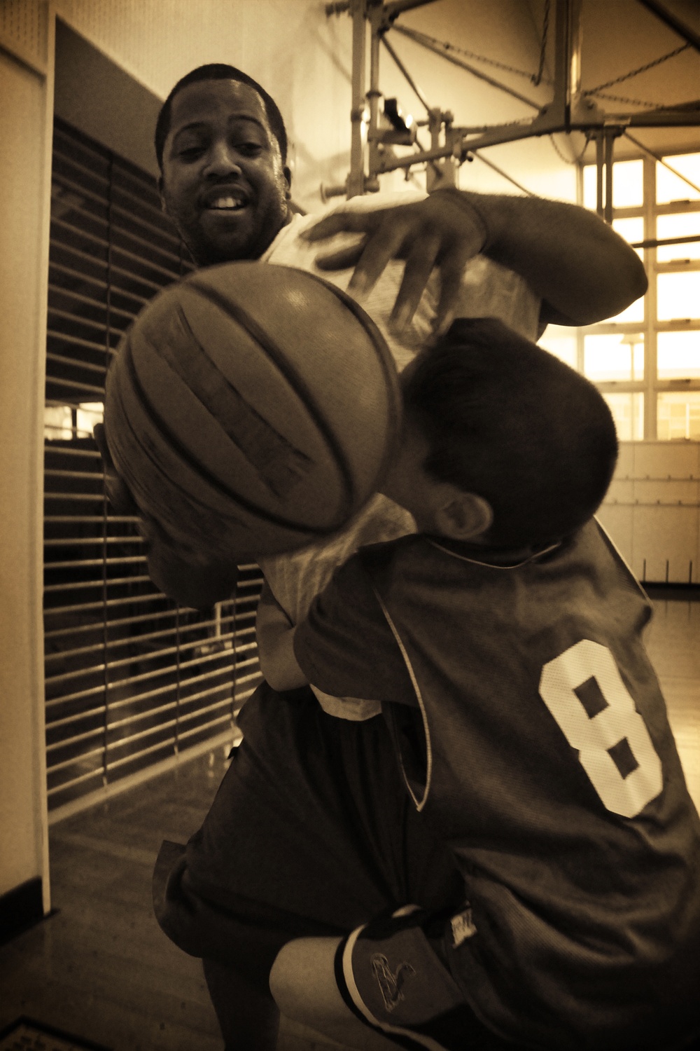 610th Air Control Flight Airmen Coach Youth Basketball Team