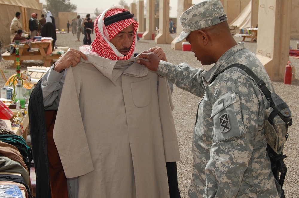 Buying items at the Q-West Souq