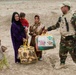 Iraqi soldiers provide blankets to Qal'at Salih citizens