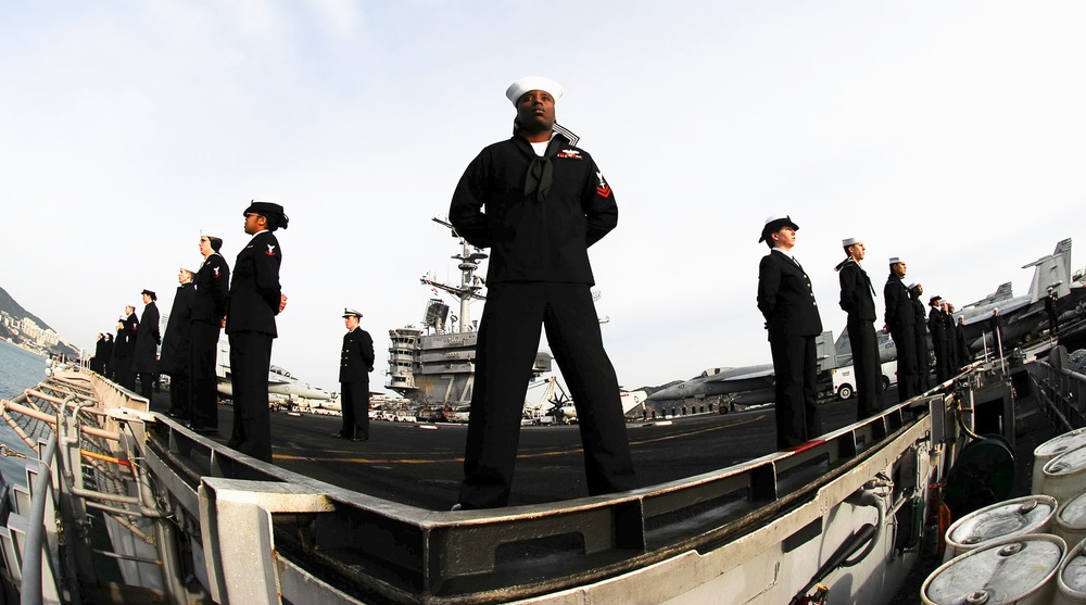 Sailors man the rails