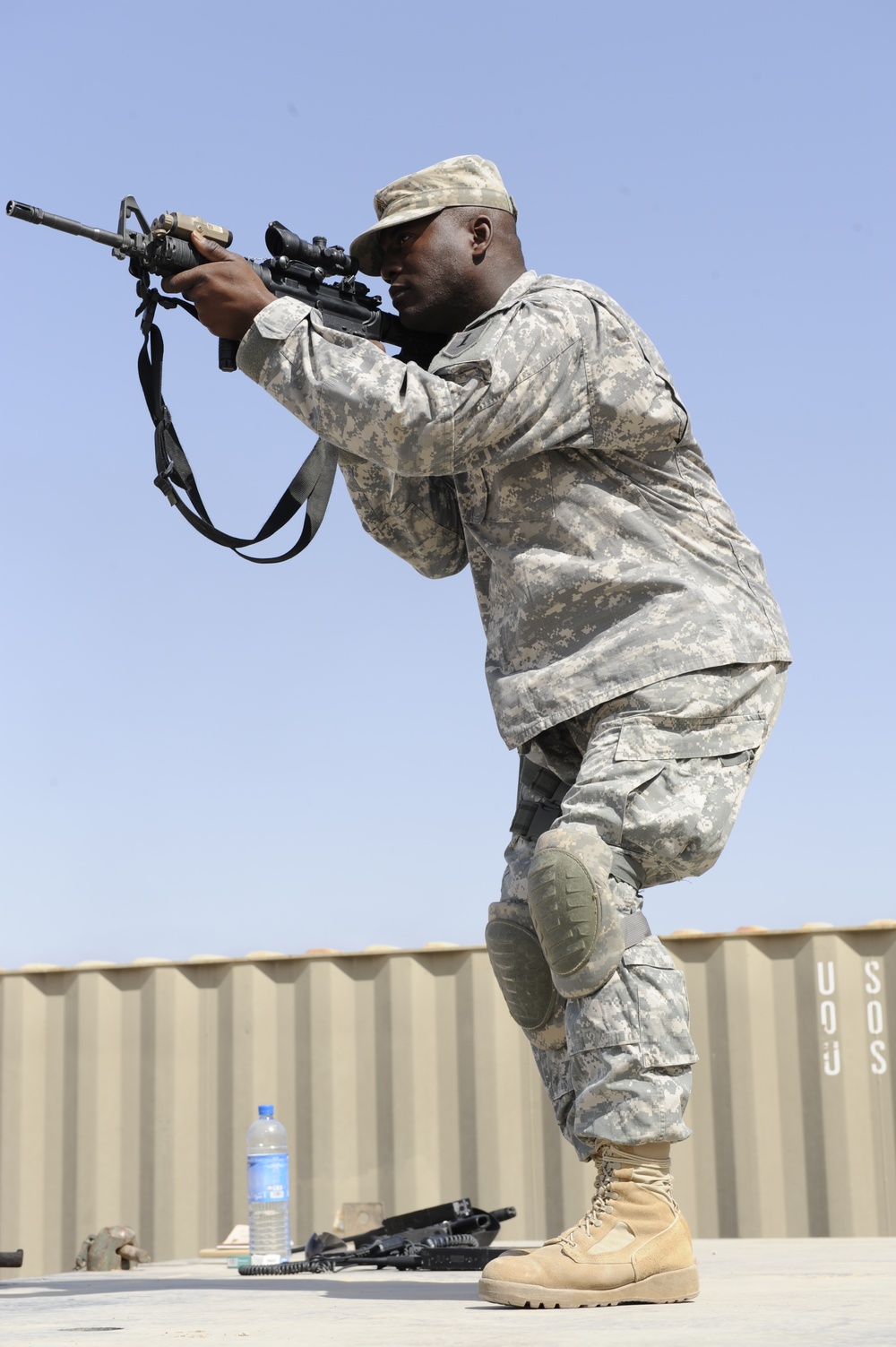 Iraqi national police officers train at headquarters in Rumaylah