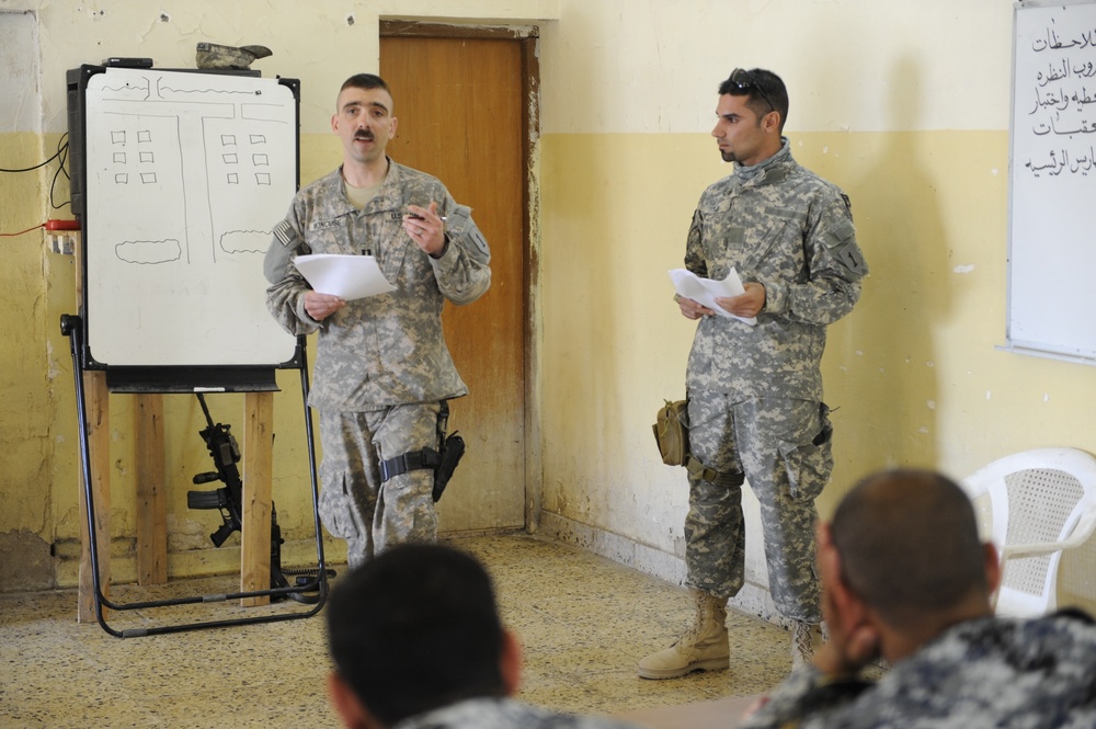 Iraqi national police officers train at headquarters in Rumaylah