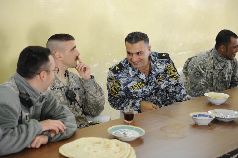 Iraqi national police officers train at headquarters in Rumaylah