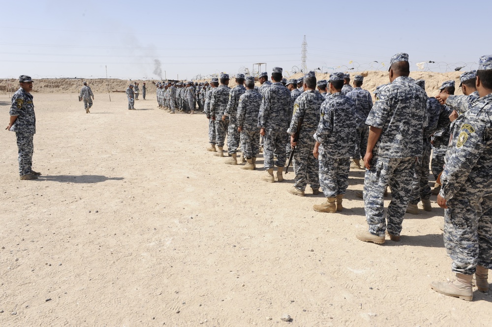 Iraqi national police officers train at headquarters in Rumaylah