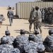 Iraqi national police officers train at headquarters in Rumaylah