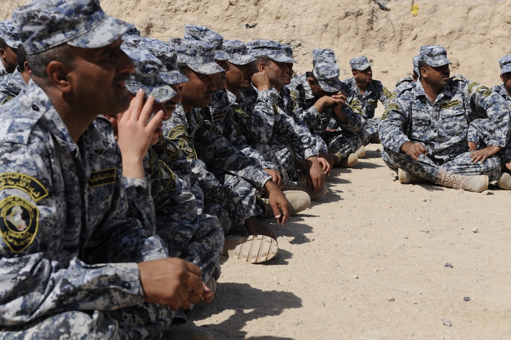 Iraqi national police officers train at headquarters in Rumaylah