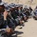 Iraqi national police officers train at headquarters in Rumaylah