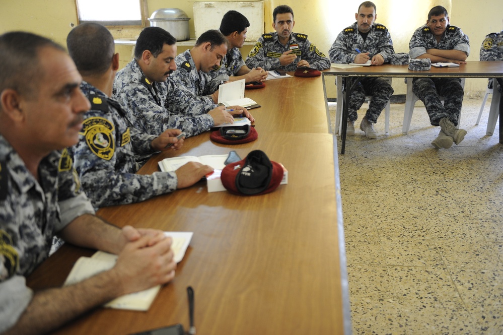 Iraqi national police officers train at headquarters in Rumaylah