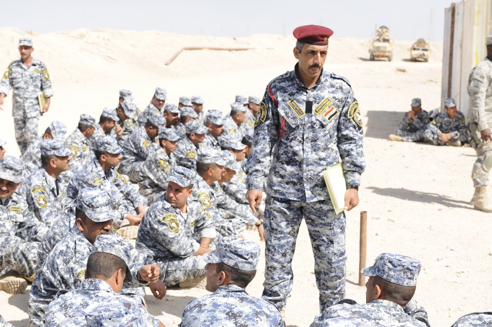 Iraqi national police officers train at headquarters in Rumaylah