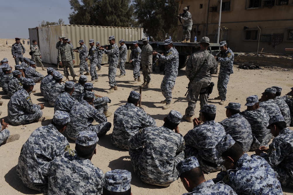 Iraqi national police officers train at headquarters in Rumaylah