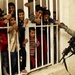 Iraqi army, Iron Brigade Soldiers give clothes, toys to widows in Arab Jabour