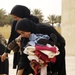 Iraqi army, Iron Brigade Soldiers give clothes, toys to widows in Arab Jabour
