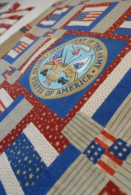 Soldiers wives create quilts for wounded