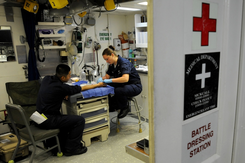 Corpsmen Provide Medical Care to the Sailors Aboard USS Leyte Gulf