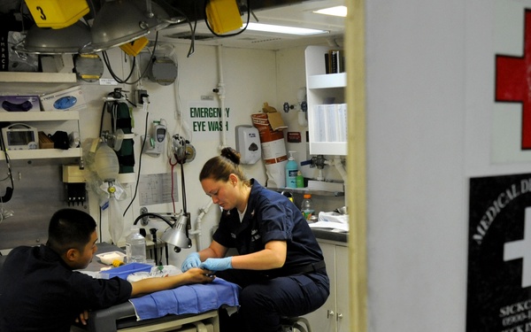 Corpsmen Provide Medical Care to the Sailors Aboard USS Leyte Gulf