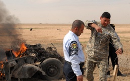 Iraqi explosive ordnance disposal police learn advanced crime scene investigation techniques