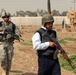 Baghdad University gets spring cleaning: Keystone troops and Iraqi police sweep area for unexploded ordnance