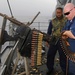 Machine gun qualification shoot aboard the guided-missile cruiser USS Vella Gulf