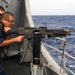 Machine gun qualification shoot aboard the guided-missile cruiser USS Vella Gulf